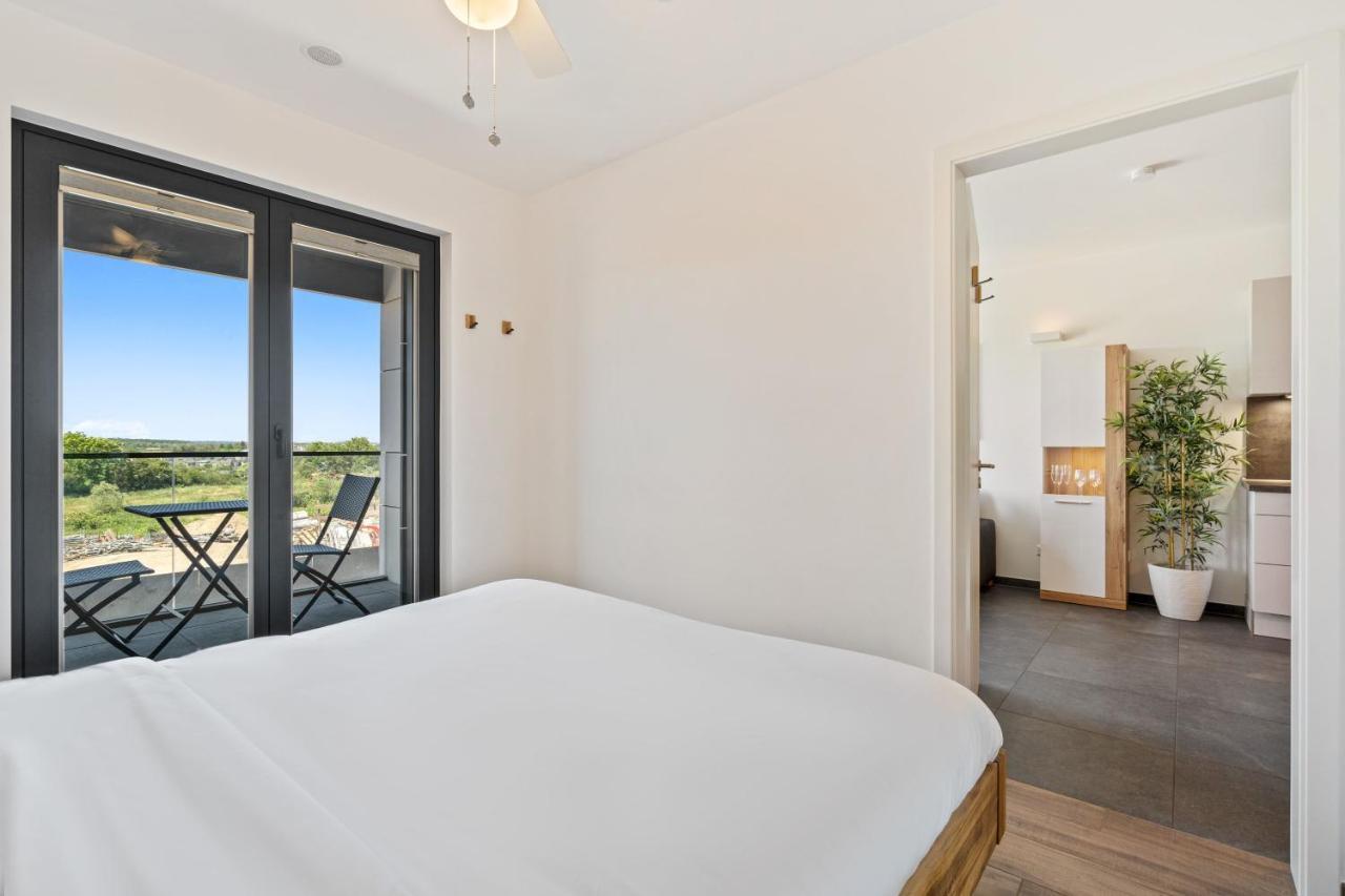 Cloche D'or Proximity - Sleek Urban Space Apartment